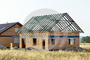 Construction of a house made of bricks, roof repair, new building