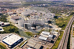 Construction of house, multi-storey residential area in city. On sunset. Aerial view of Multistory houses. Real estate