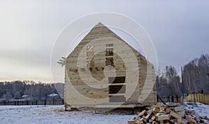 Construction of a house from profiled timber