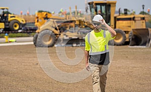 construction inspector man, copy space. construction inspector man at building site. construction inspector man outdoor