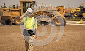 construction inspector man, copy space. construction inspector man at building site. construction inspector man outdoor