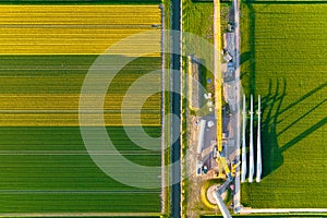 Construction and installation of a wind turbine. Production of clean green energy. Technology and innovation.