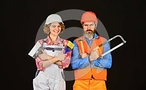 Construction job occupation. Construction workers. Home renovation. Couple renovating house. Woman builder hard hat. Man