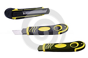 Construction knife with retractable blades on a white background isolate