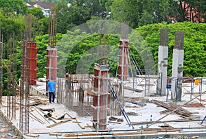 Construction laborer team working on high ground building commercial in site workplace