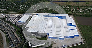 Construction of a large factory, Industrial exterior, panoramic view from the air. Construction site, metal structure