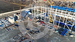 Construction of a large plant or factory, Industrial exterior, panoramic view from the air, Construction site, metal