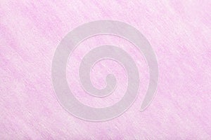 Light purple background of felt fabric. Texture of woolen textile