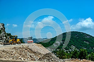 Construction machinery for the construction of a mountain road