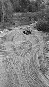 Construction machinery, formation of a landscape from sand
