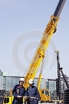 Construction machinery and workers