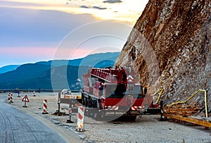 Construction machines on a mountain road