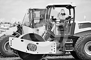 construction man worker at construction heavy machinery or roadwork machine equipment outdoor photo