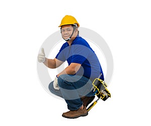 Construction man workers in blue shirt with Protective gloves, helmet with tool belt sitting and Thumbs up isolated on white