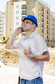 Construction manager holding project