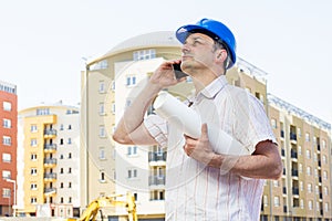 Construction manager holding project