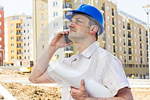 Construction manager holding project