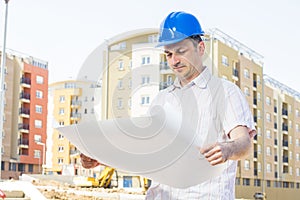 Construction manager looking project