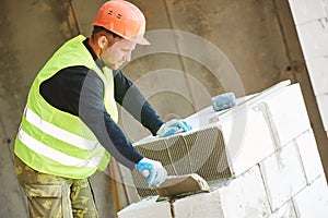 Construction mason worker bricklayer
