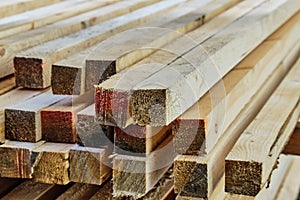 Construction material made of machined wood sticks
