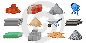 Construction material piles and equipment, cement, sand and bricks. Building blocks, wood planks, wheelbarrow and