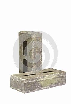 Construction Materials. Pair of Aged White Green Bricks With Rectangular Wholes for Construction Isolated on White