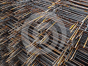 Construction mesh for concrete reinforcement. Rusty bars for use on the construction site