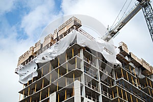 Construction of the modern condo buildings with huge windows and balconies in Montreal photo