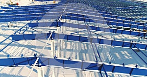 Construction of a modern factory or plant, Industrial area in winter, panoramic view from the air. Modern plant on the