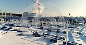 Construction of a modern factory or plant, Industrial area in winter, panoramic view from the air. Modern plant on the