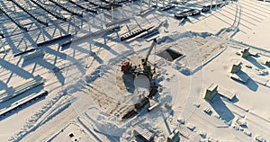 Construction of a modern factory or plant, Industrial area in winter, panoramic view from the air. Modern plant on the