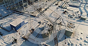 Construction of a modern factory or plant, Industrial area in winter, panoramic view from the air. Modern plant on the