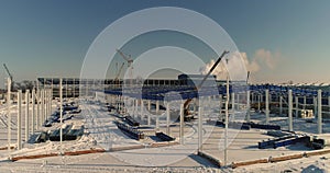 Construction of a modern factory or warehouse, modern industrial exterior, panoramic view, Modern storehouse