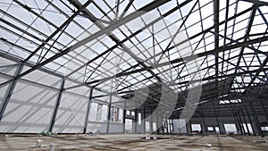 Construction of modern factory or warehouse, modern industrial exterior, panoramic view. Modern storehouse construction