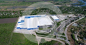 The construction of a modern production building or factory, the exterior of a large modern production plant or factory