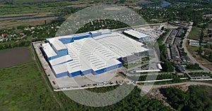The construction of a modern production building or factory, the exterior of a large modern production plant or factory