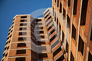 The construction of a multi-storey building.