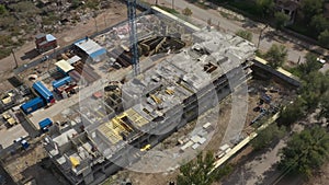 construction of a multi-storey building, tower crane from above