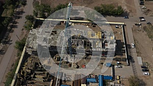 construction of a multi-storey building, tower crane from above