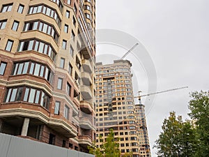 Construction of multi-storey houses in the city.