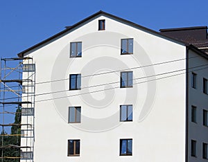 Construction of multi-storey industrial building with scaffolding