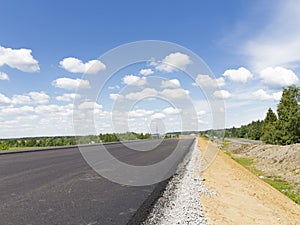 Construction of a new asphalt road in Russia