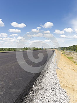 Construction of a new asphalt road, Russia