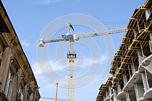 Construction of a new building opposite the old house