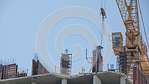 The construction of a new building, skyscraper, or structure with the help of a crane. Construction of a multi-storey residential