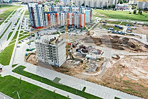 Construction of new high-rise apartment building in residential area. aerial photography