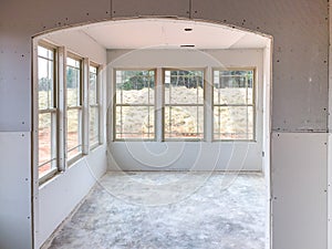 Construction of new home interior drywall installation and finish details