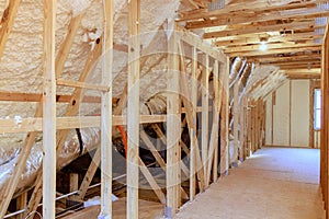 During construction of a new home, spray foam thermal hydro insulation is installed on walls
