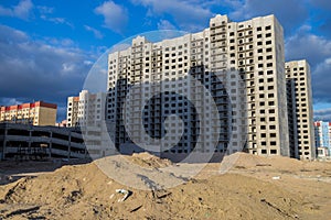 Construction of new multi-storey houses in the wasteland