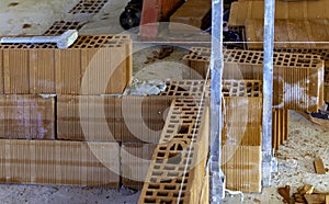 Construction of new partitioning walls with thermo-brick blocks.